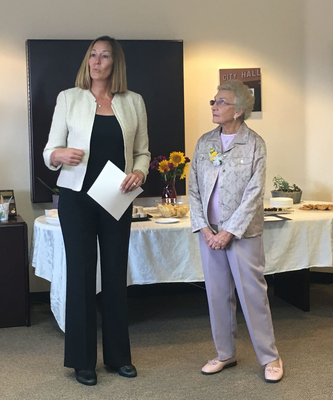 Assemblymember Jacqui Irwin honors Holocaust surivovr Celina Biniaz. 