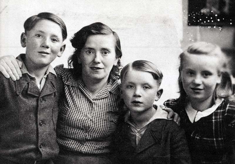 In St. Ottilien, Germany, in 1946: Irv, Taibel, Gerald, and Fay.