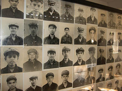 Photos of young Khmer Rouge fighters at the Tuol Sleng museum